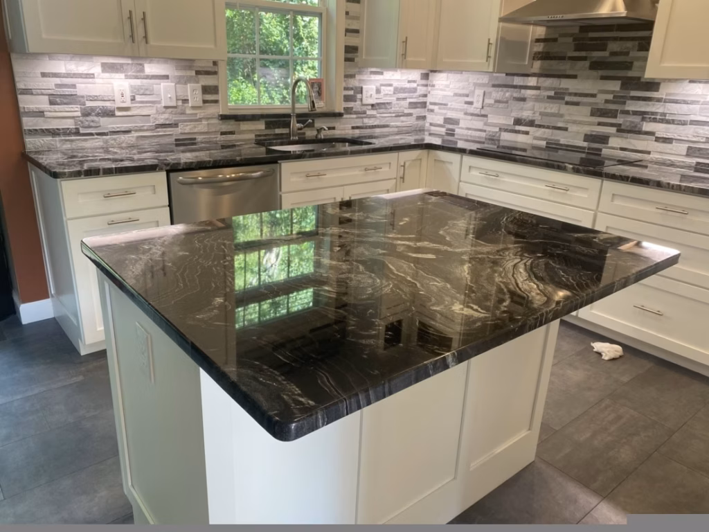 Granite countertop after professional restoration showing polished finish