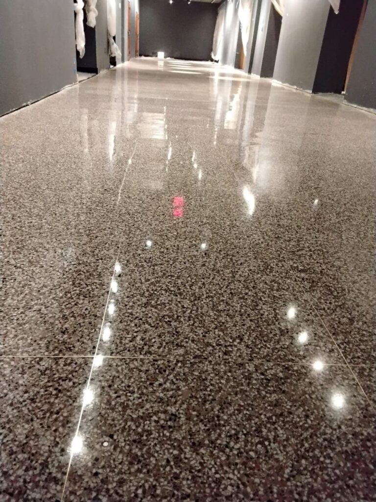 Polished terrazzo commercial corridor floor with mirror finish by Rose Restoration