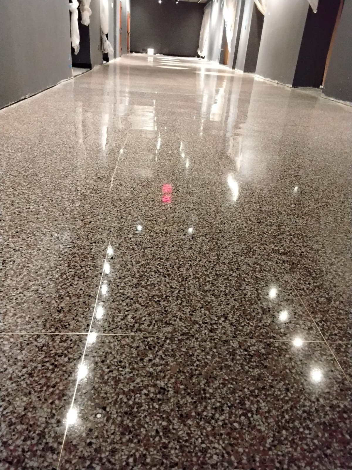 Polished terrazzo commercial corridor floor with mirror finish by Rose Restoration