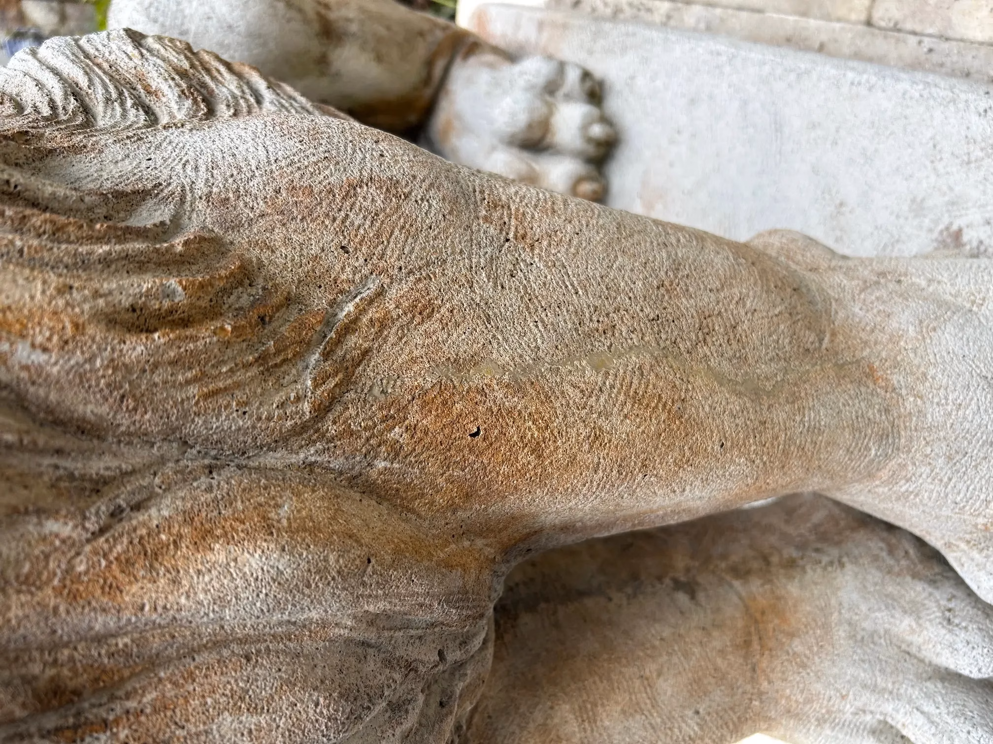 Carved stone statuary during conservation and repair by Rose Restoration
