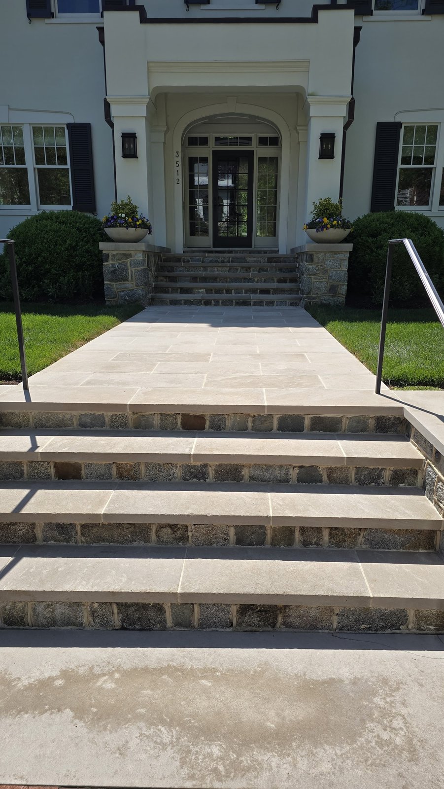 Freshly restored bluestone entrance walkway and steps to upscale residential home by Rose Restoration