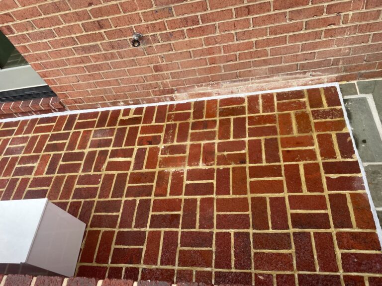 Exterior brick patio showing mortar joint restoration by Rose Restoration
