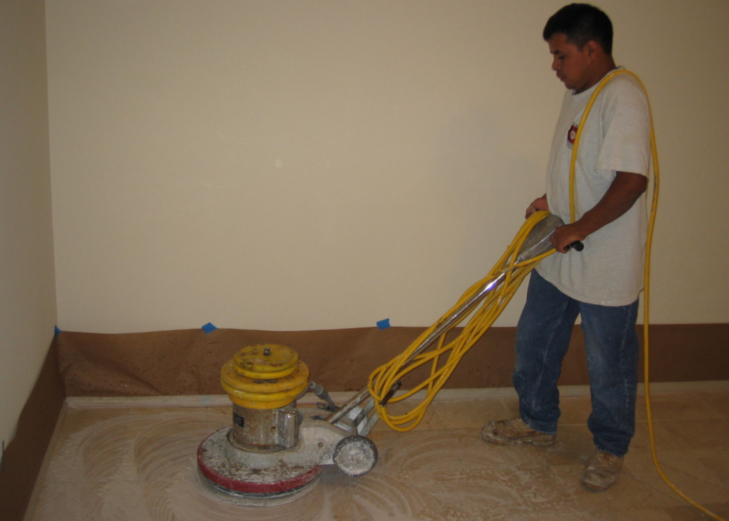 Mario Perez performing stone restoration work in 2006 at Rose Restoration