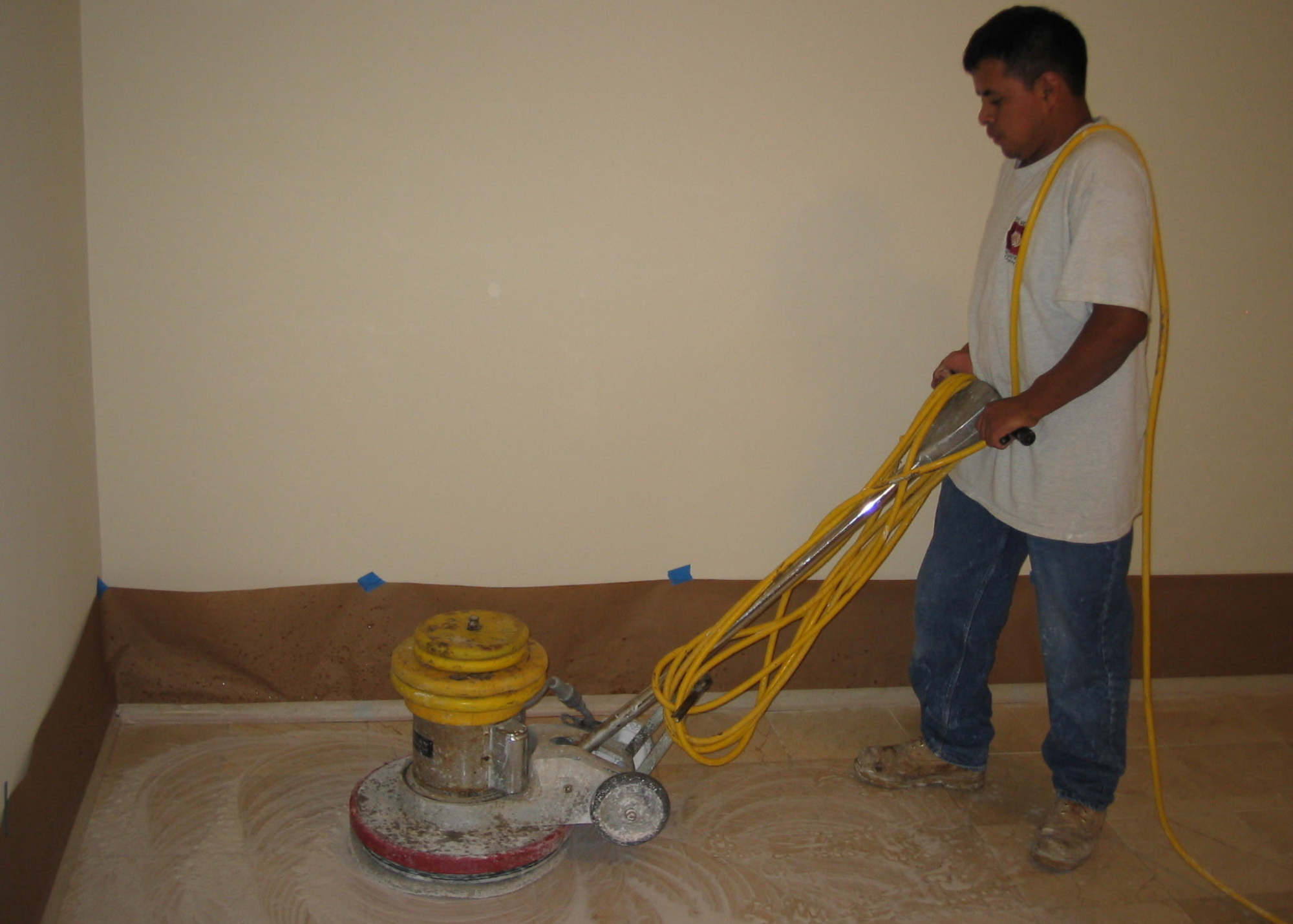 Mario Perez performing stone restoration work in 2006 at Rose Restoration