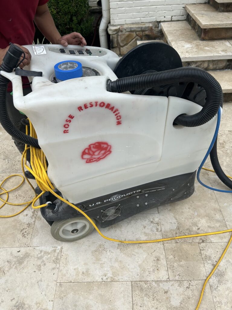 Residential stone patio floor restoration in progress by Rose Restoration