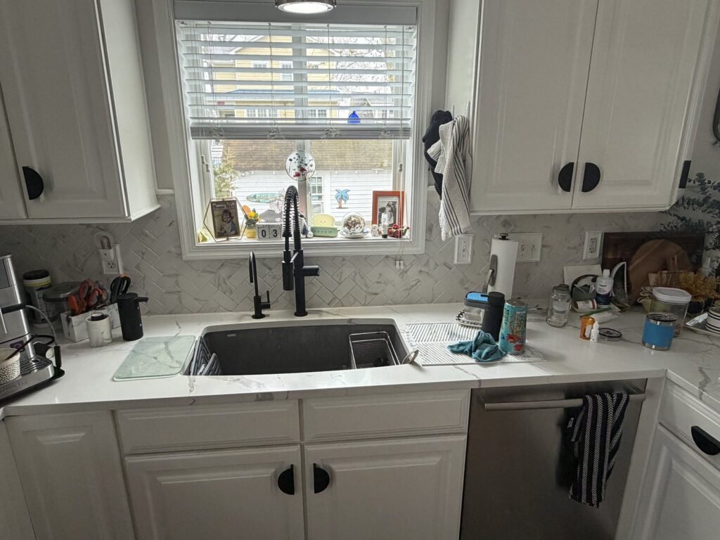 Residential marble kitchen countertop etching before Rose Restoration hone-polish restoration