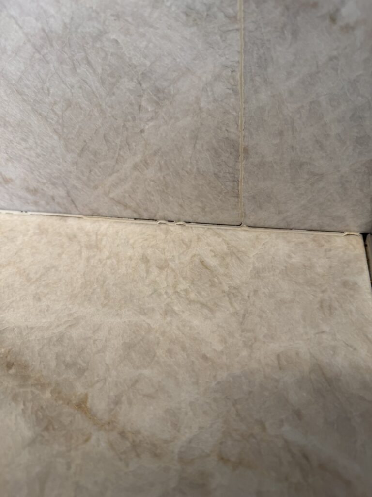 Commercial marble surface before professional restoration by Rose Restoration
