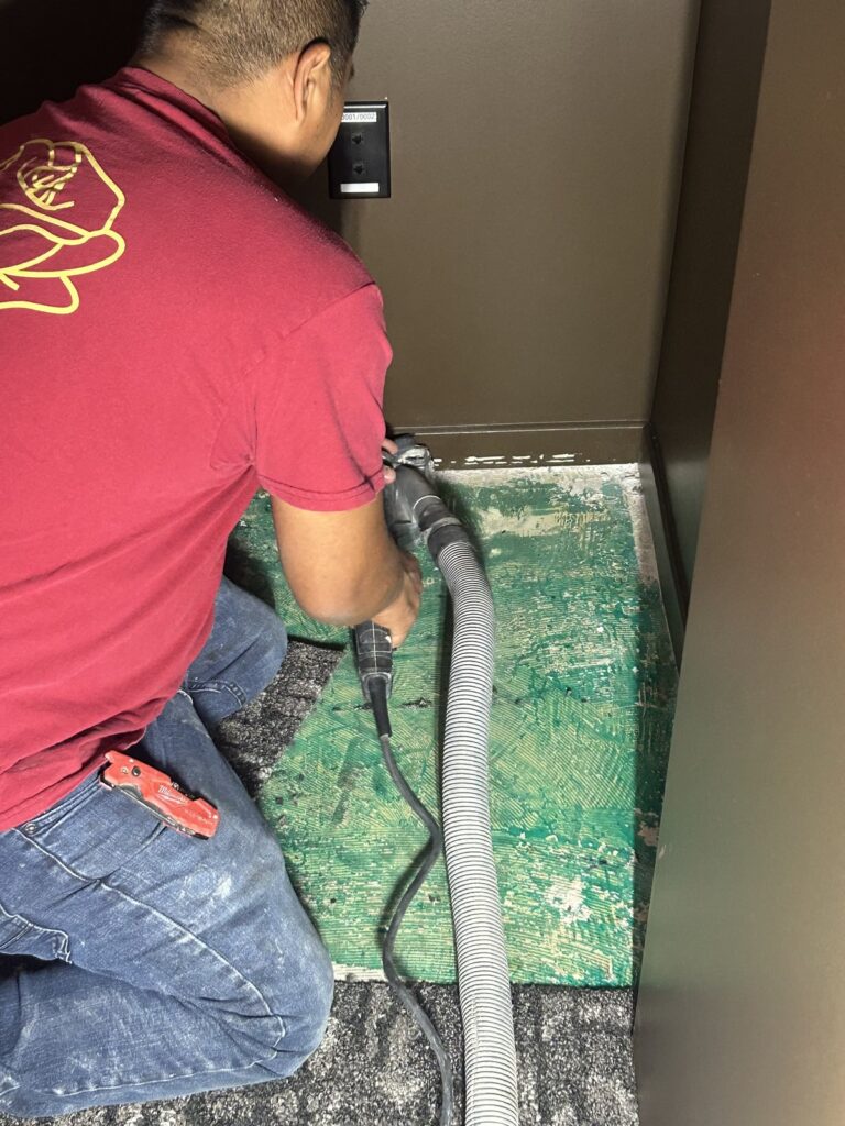 Commercial elevator epoxy floor during restoration by Rose Restoration
