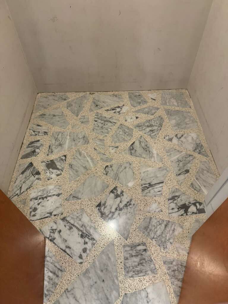 Polished marble mosaic floor detail by Rose Restoration