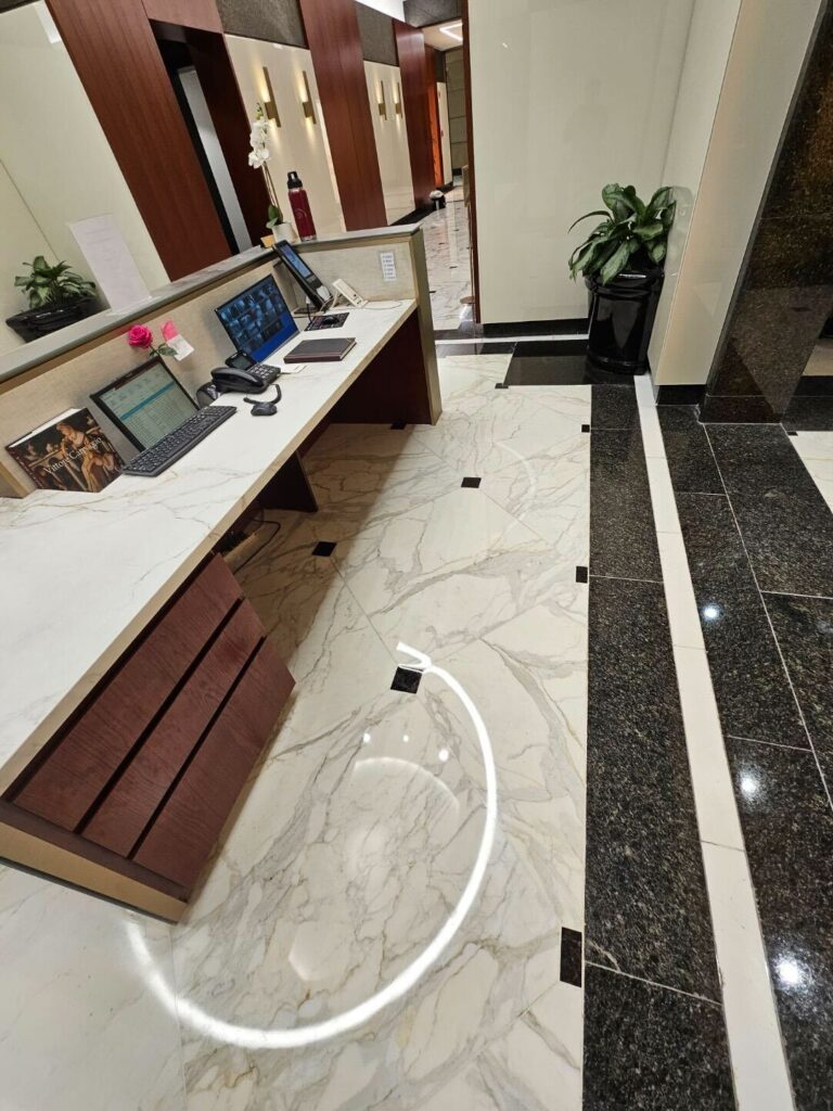 Premium commercial marble lobby restoration showing polished Calacatta marble by Rose Restoration in Washington DC