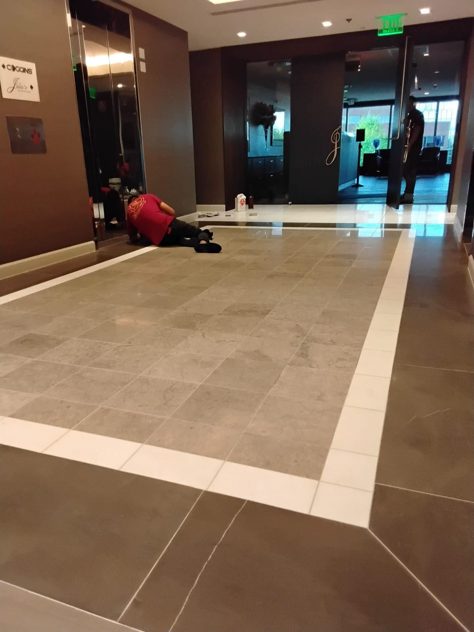 Rose Restoration crew polishing commercial lobby floor