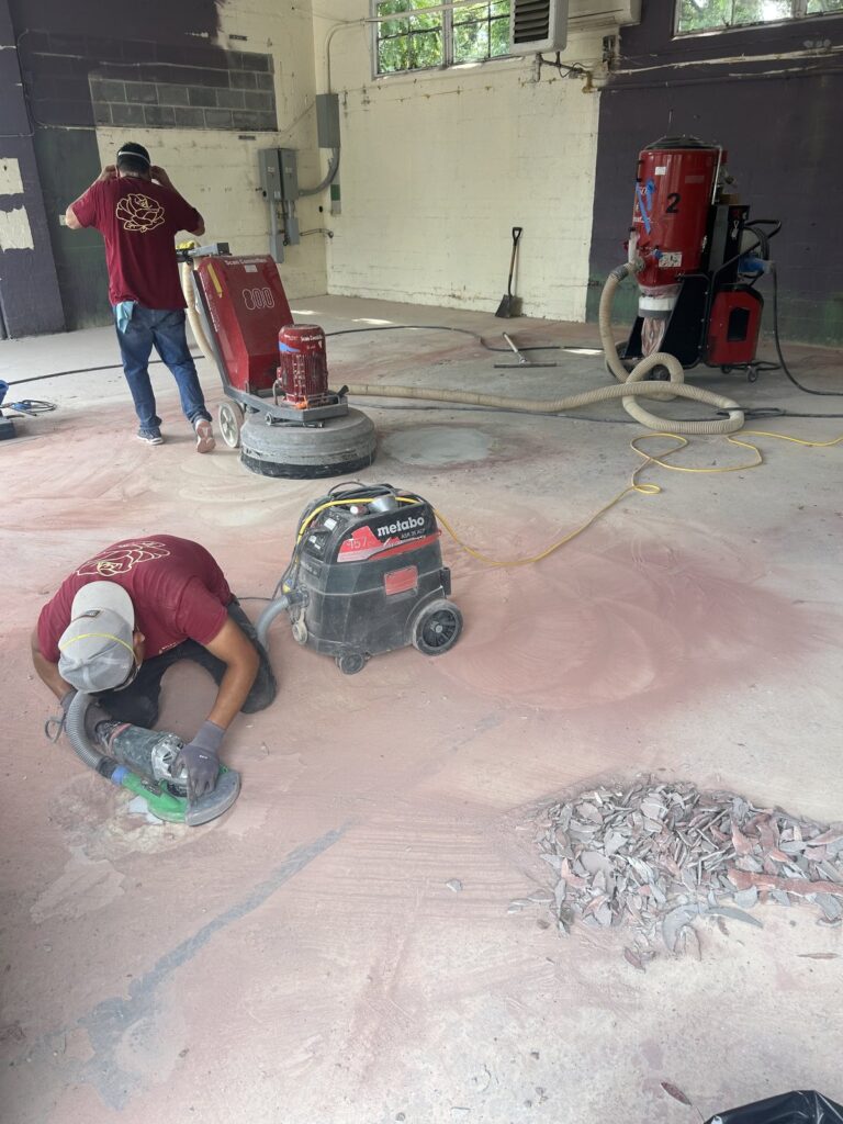 Large commercial retail concrete floor during polishing by Rose Restoration