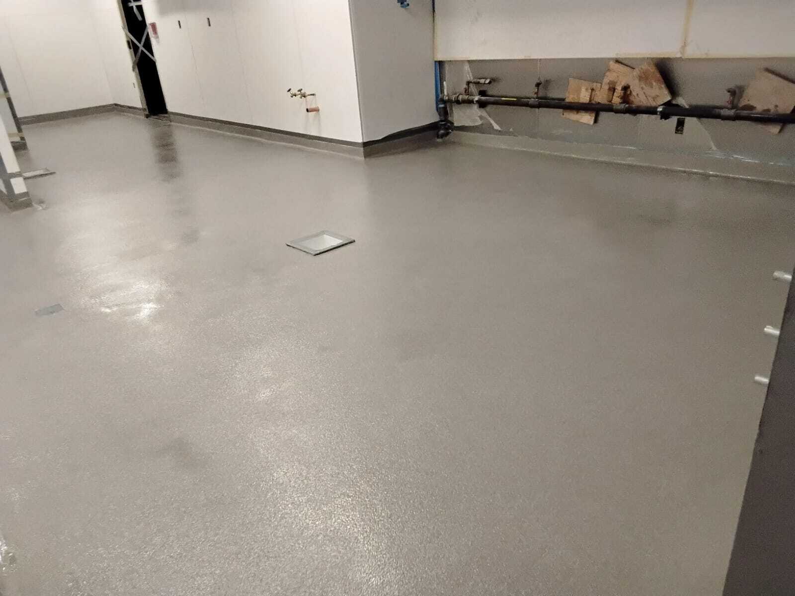 Commercial kitchen epoxy floor coating by Rose Restoration