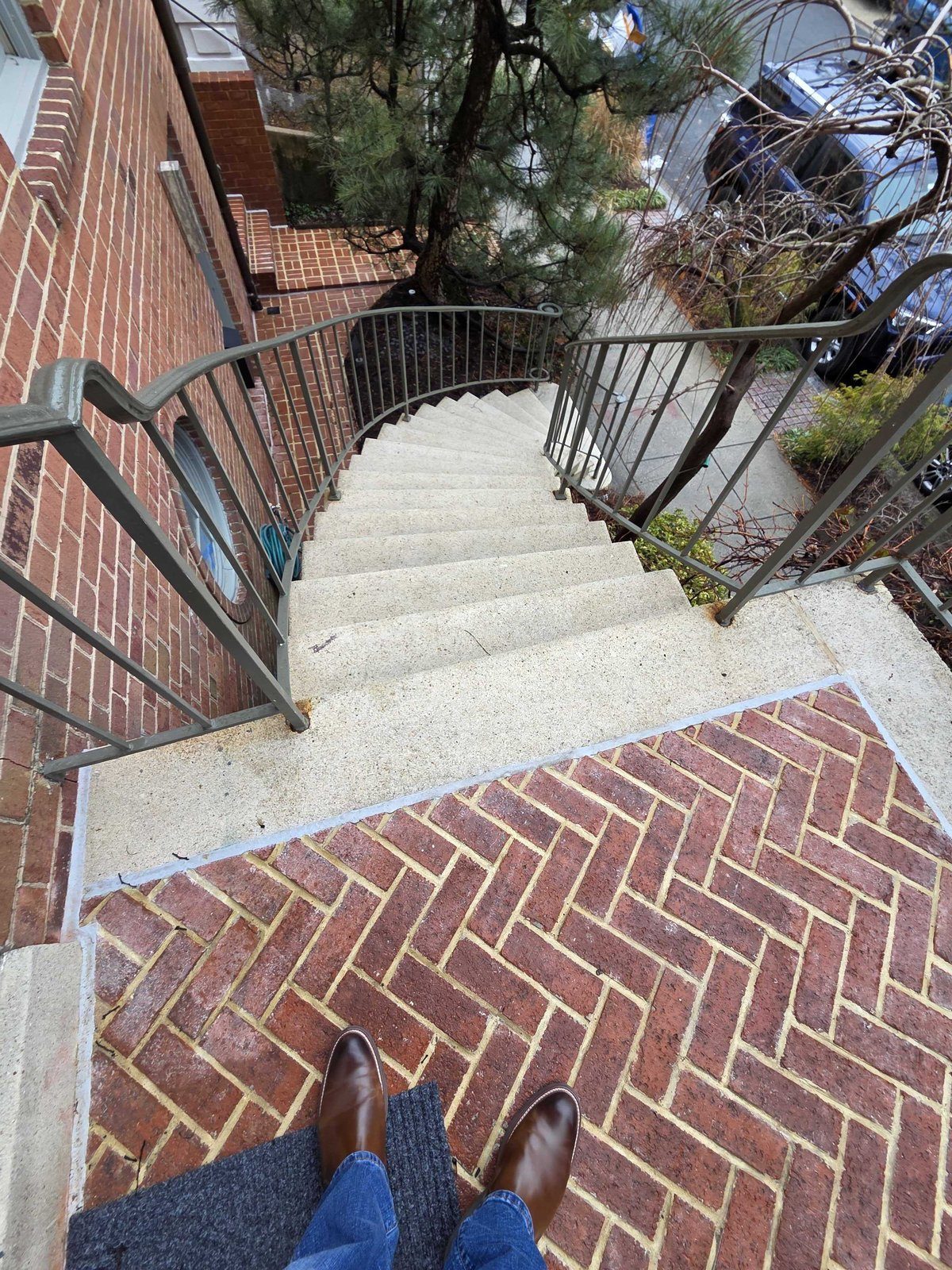 Residential exterior stone stair treads and landing before restoration work