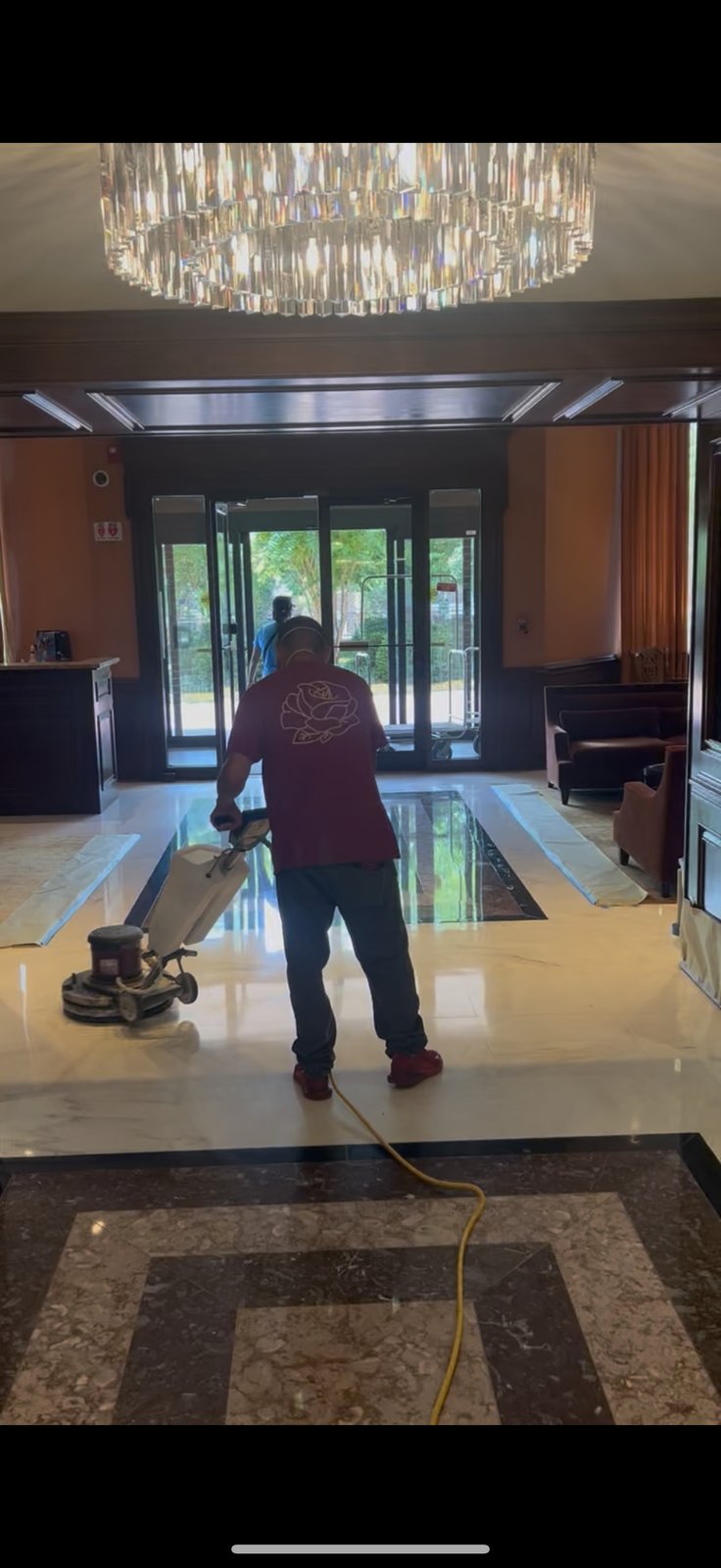 Hotel lobby marble floor restoration in progress by Rose Restoration