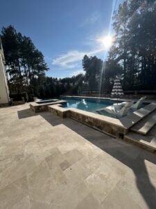 Natural stone surface showing wear from improper cleaners before Rose Restoration