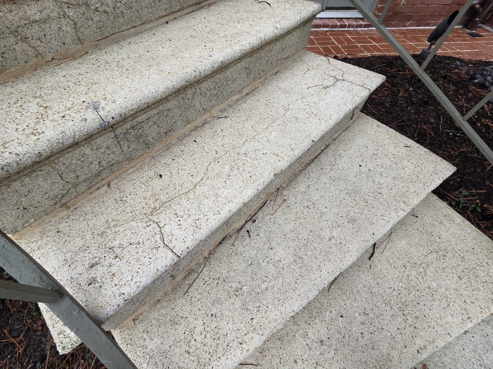 Residential exterior stone stair treads before restoration in McLean VA area