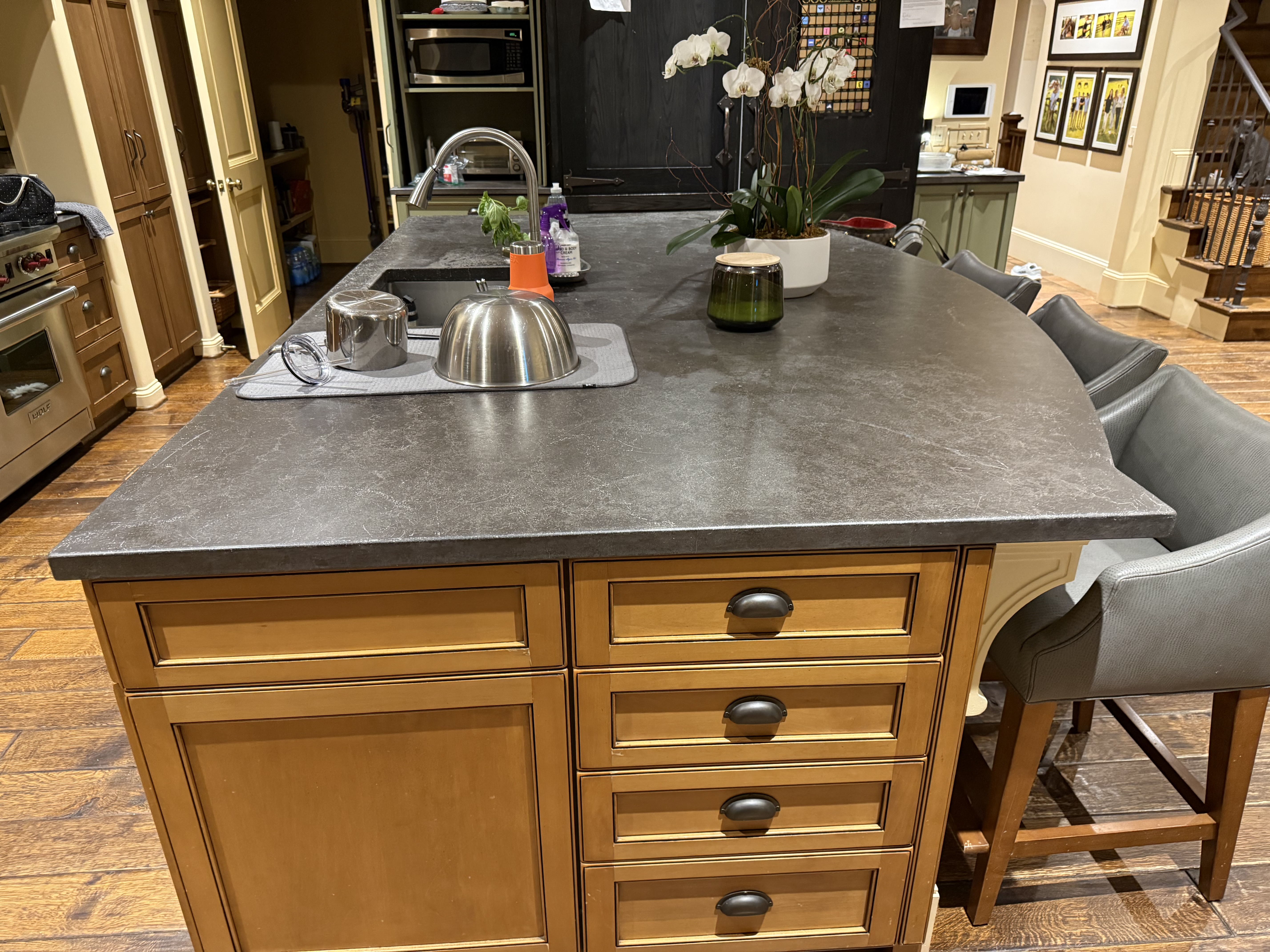 Restored dark stone kitchen island countertop