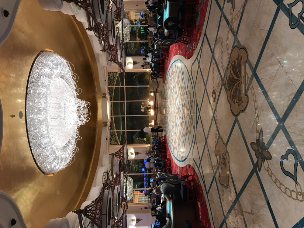 Restored mosaic marble walkway through the Baha Mar casino floor under the gold dome, polished by Rose Restoration