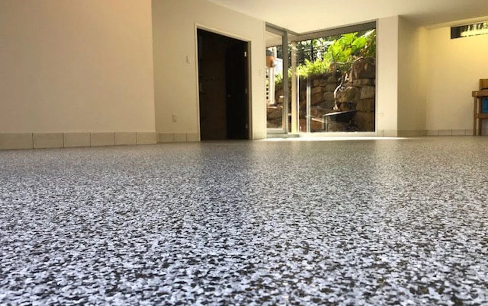 Finished epoxy flake garage floor installed by Rose Restoration
