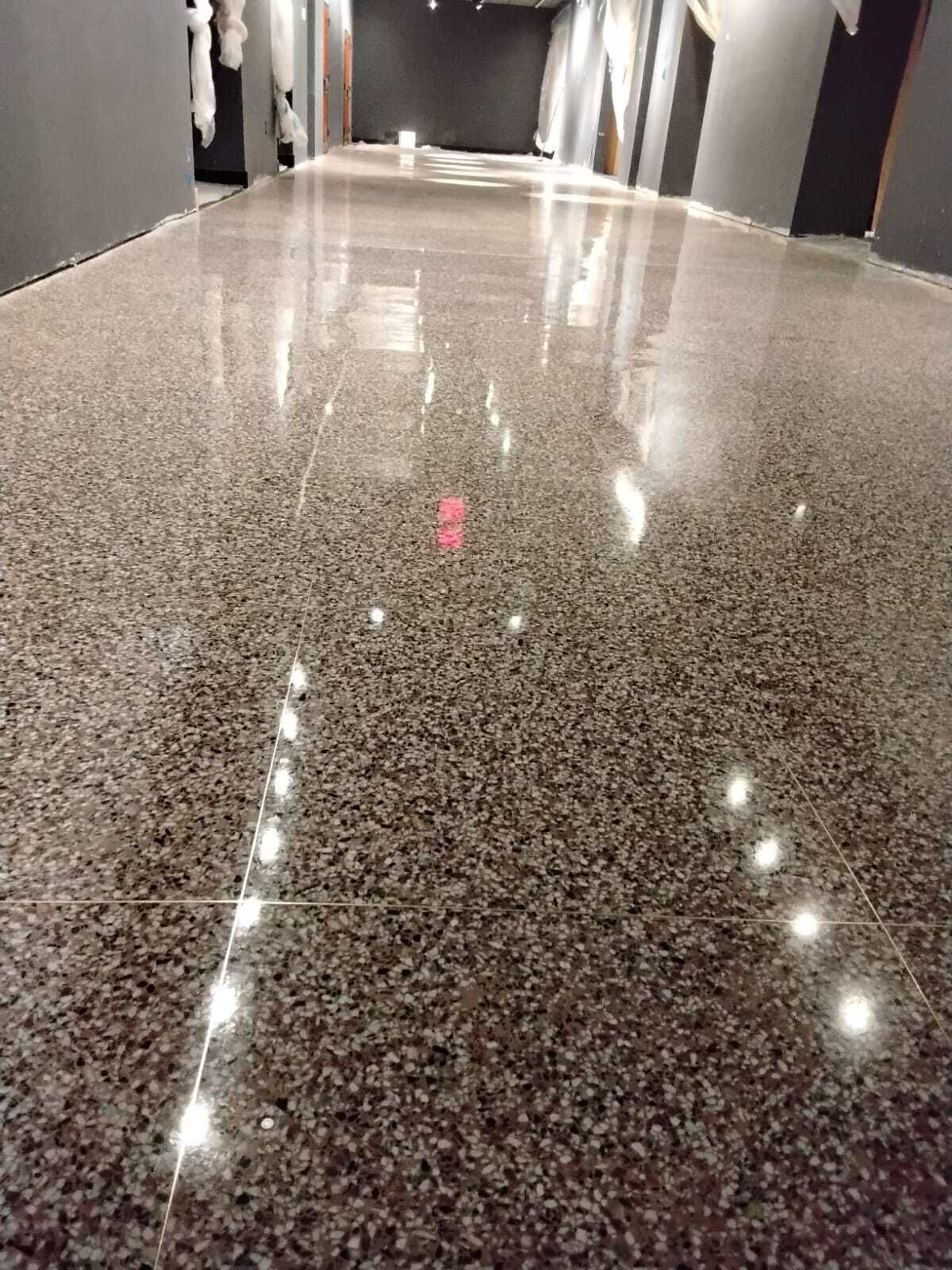 Restored terrazzo showing aggregate and divider strips in a Washington DC museum