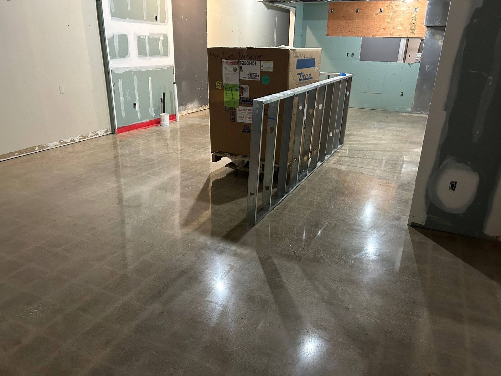 Restored and polished restaurant floor with finished bar by Rose Restoration
