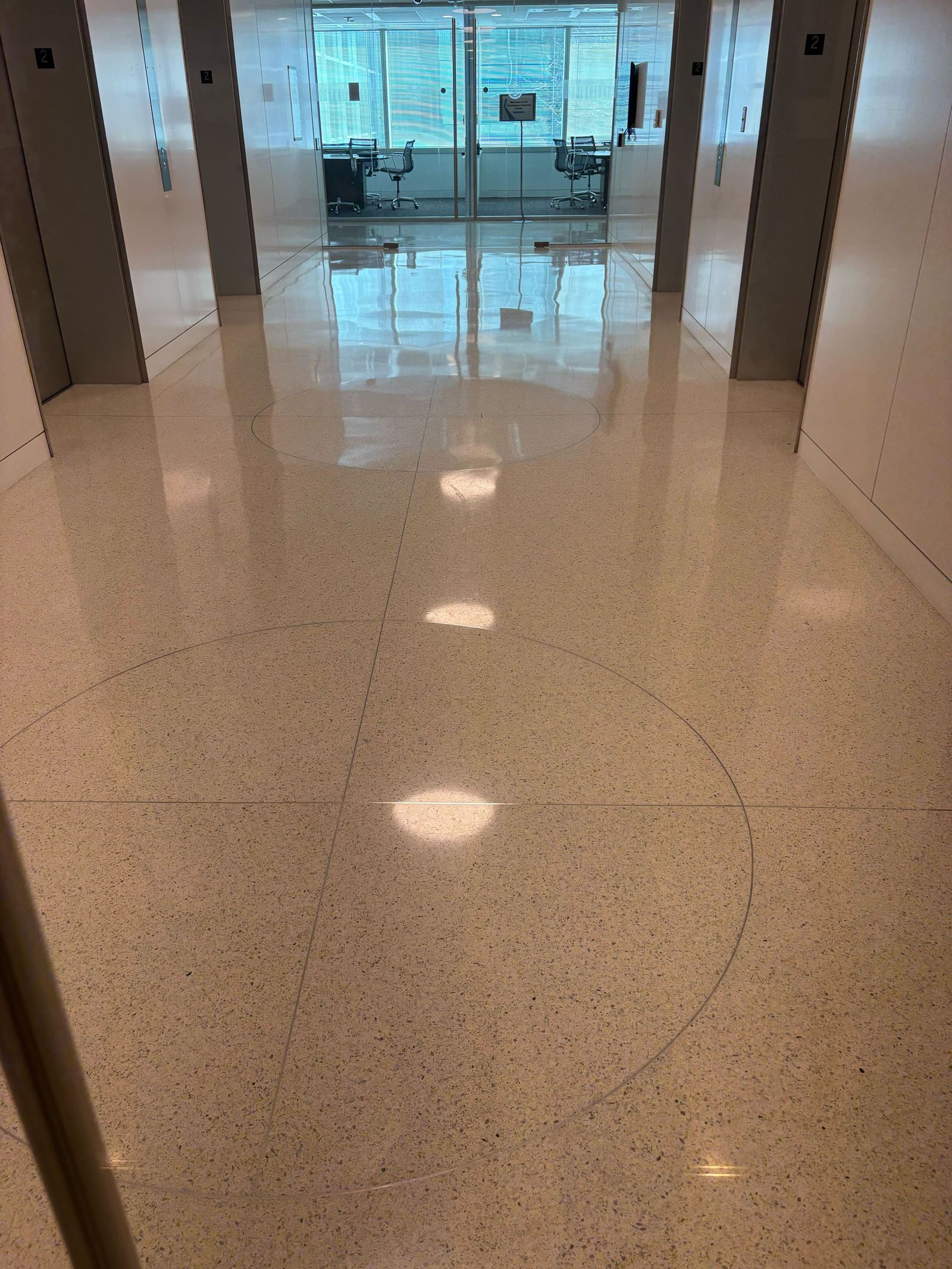 Polished terrazzo corridor in an office building restored by Rose Restoration