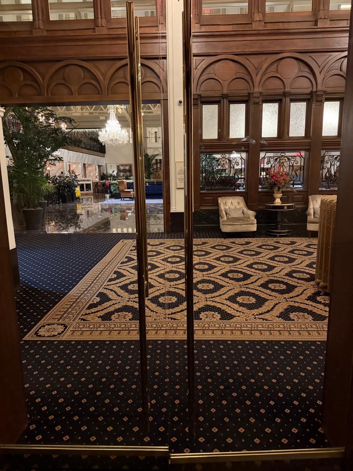 Ornate patterned stone floor in a Washington DC hotel lobby restored by Rose Restoration