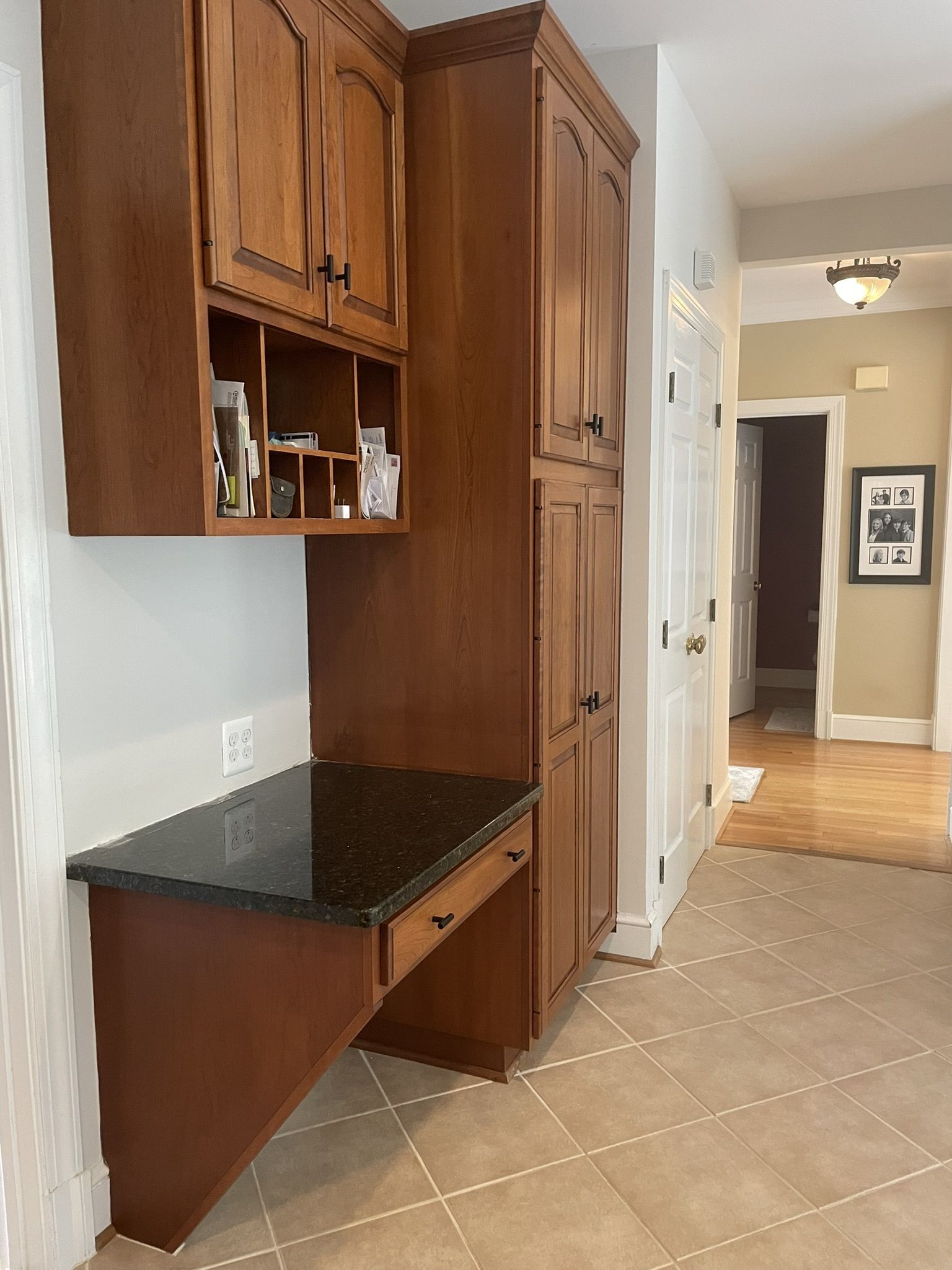 Wood kitchen cabinetry after refinishing by Rose Restoration