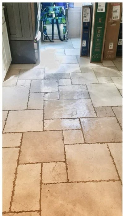 Travertine kitchen floor before restoration