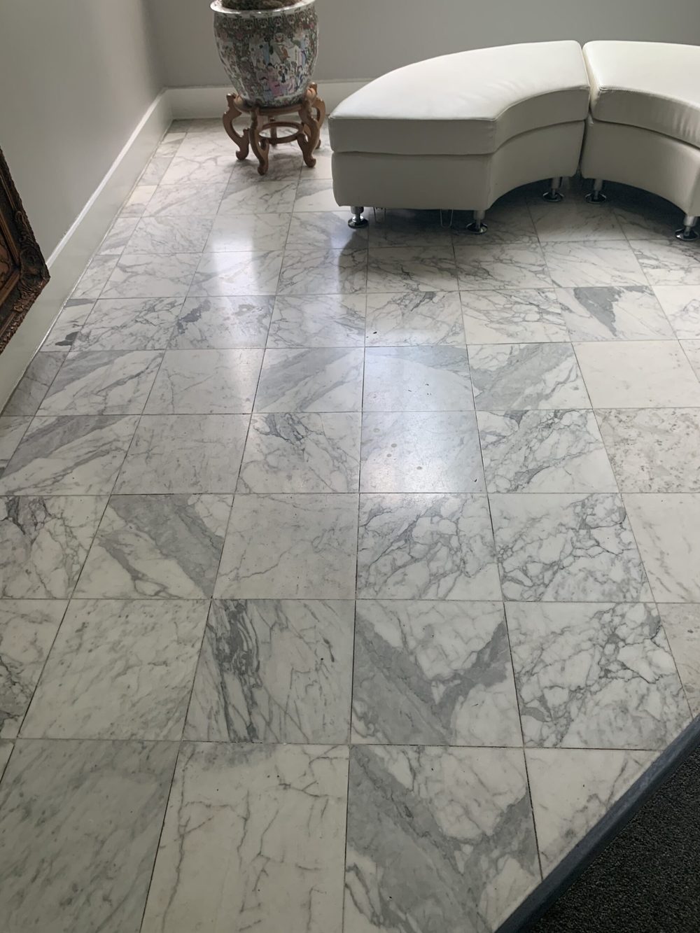 Polished Carrara marble tile floor restored by Rose Restoration