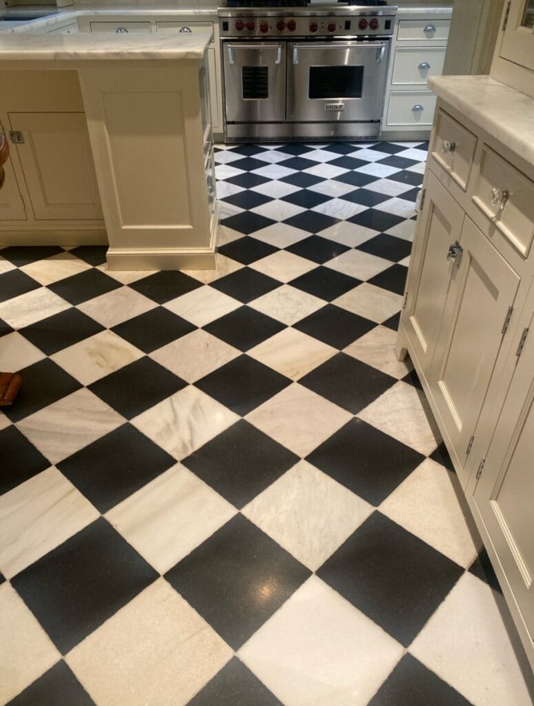 Black and white checkerboard floor from a Rose Restoration job in Bethesda, MD