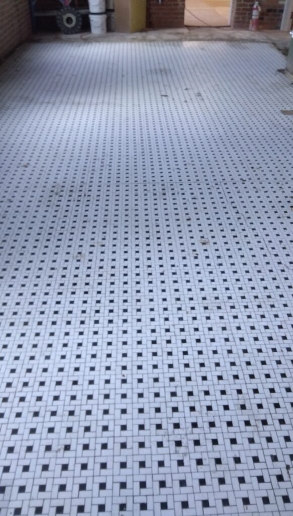 Black and white hexagonal marble mosaic floor