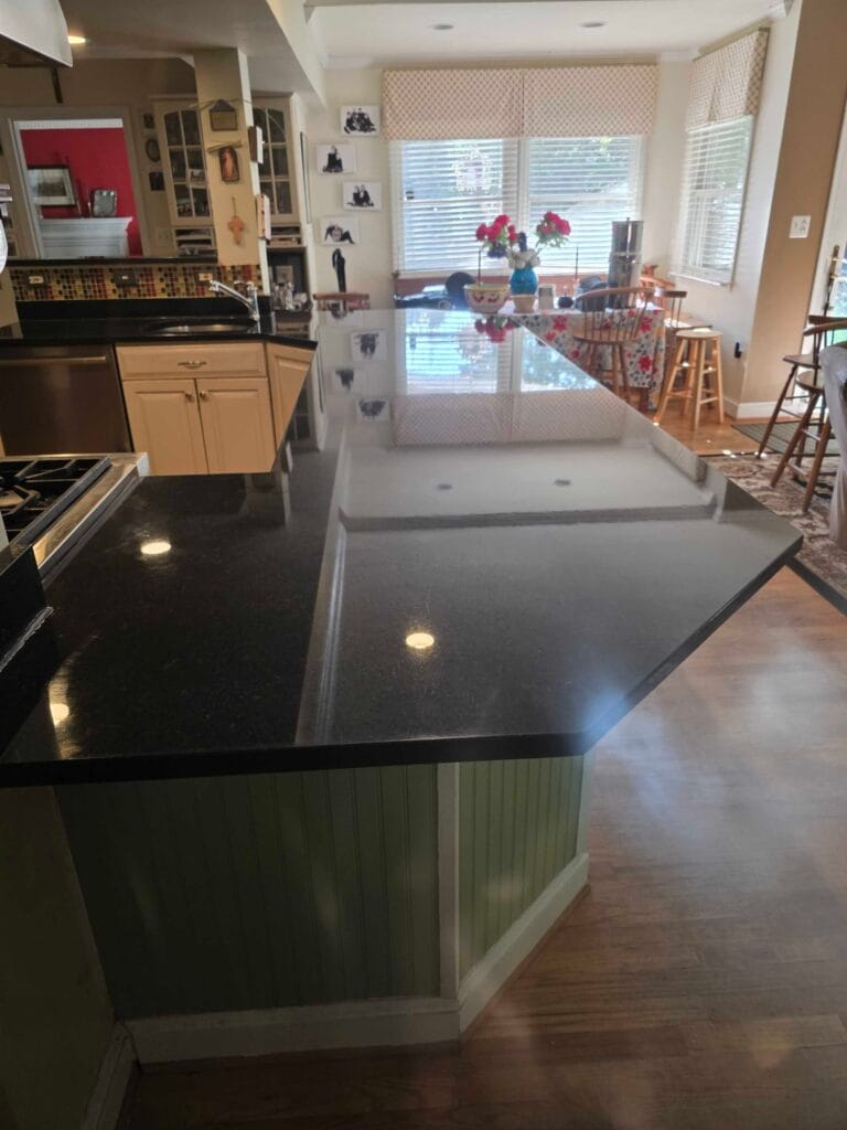 Black granite countertop with undermount sink from a Rose Restoration job in Silver Spring, MD
