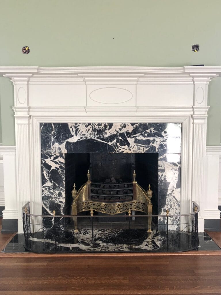 Black marble fireplace surround