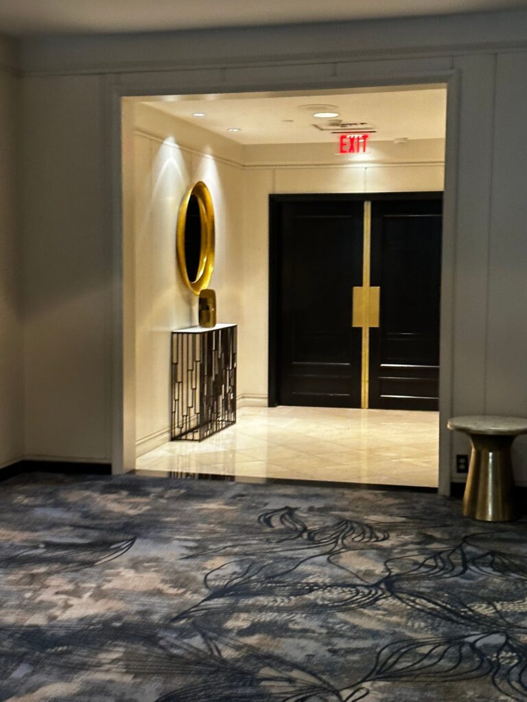 Bronze doors in an elevator lobby