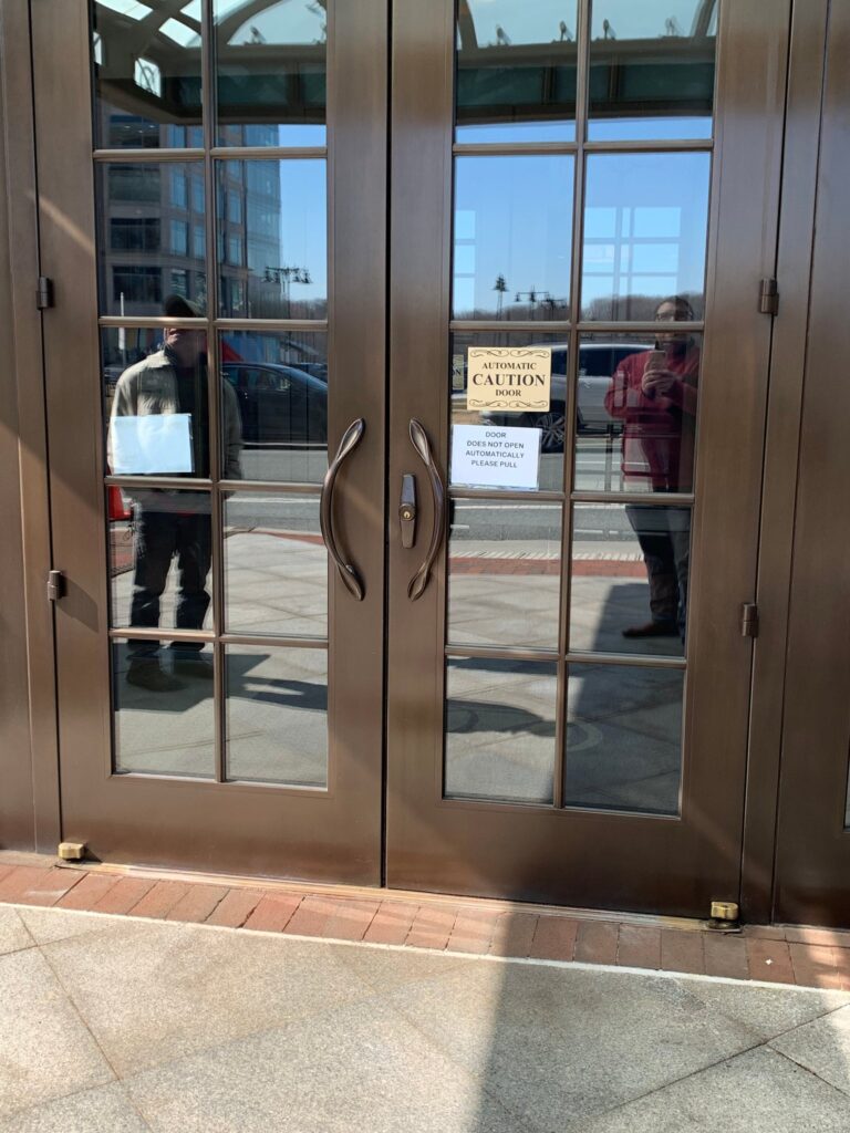 Bronze double doors with glass panels