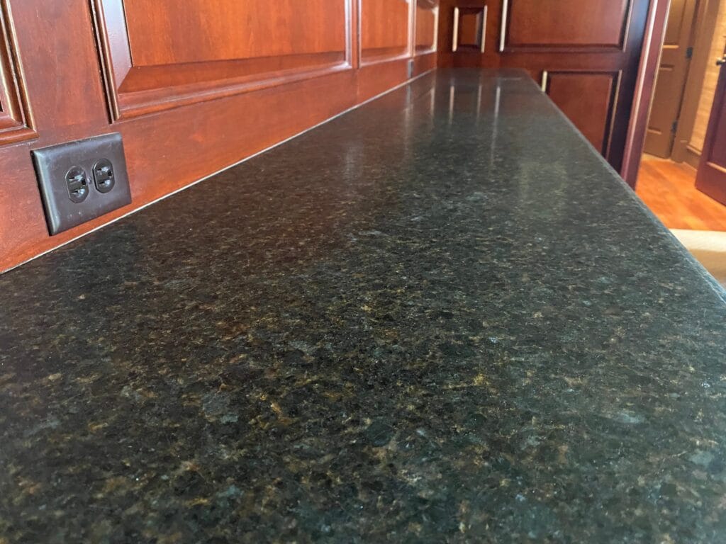 Dark granite countertop, polished