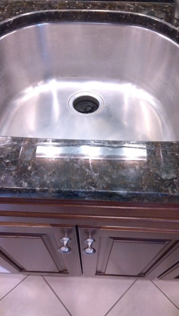 Dark stone countertop from a Rose Restoration job in Springfield, VA
