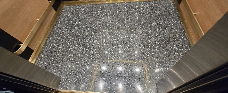 Elevator cab stone floor after polishing