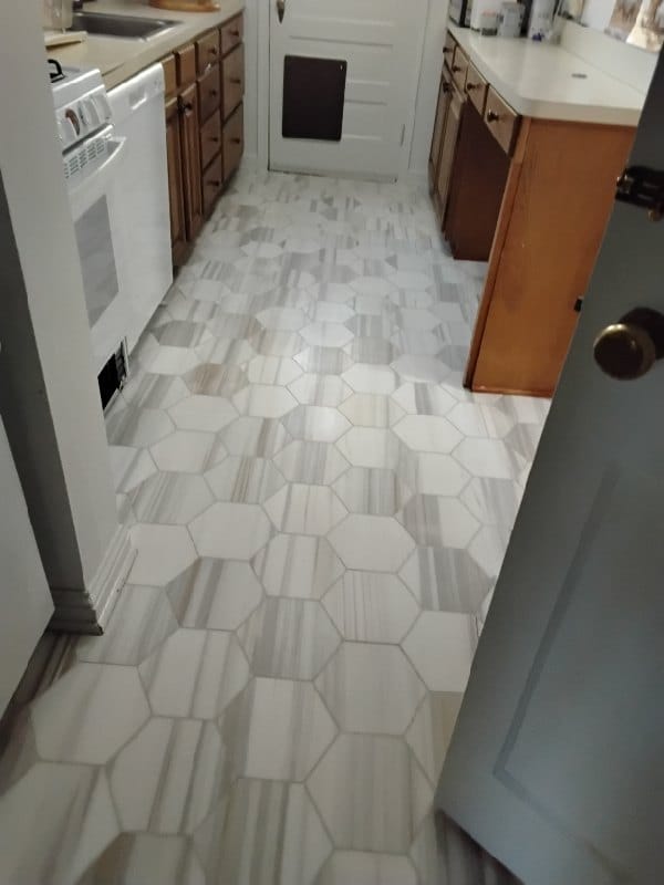 Hexagonal tile floor with gray veining from a Rose Restoration job in Takoma Park, MD