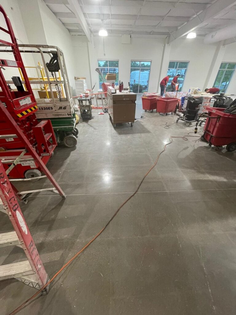 Polished concrete floor during a commercial job