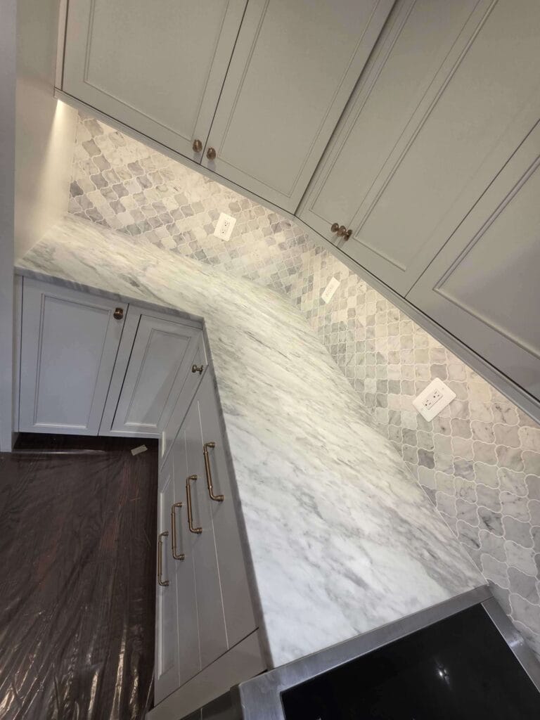 Marble countertop with cabinets from a Rose Restoration job in McLean, VA