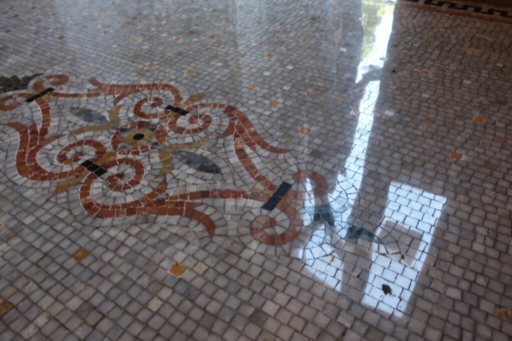 Marble mosaic floor with an inlaid medallion