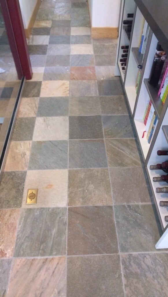 Multicolor stone tile floor from a Rose Restoration job in Washington, DC