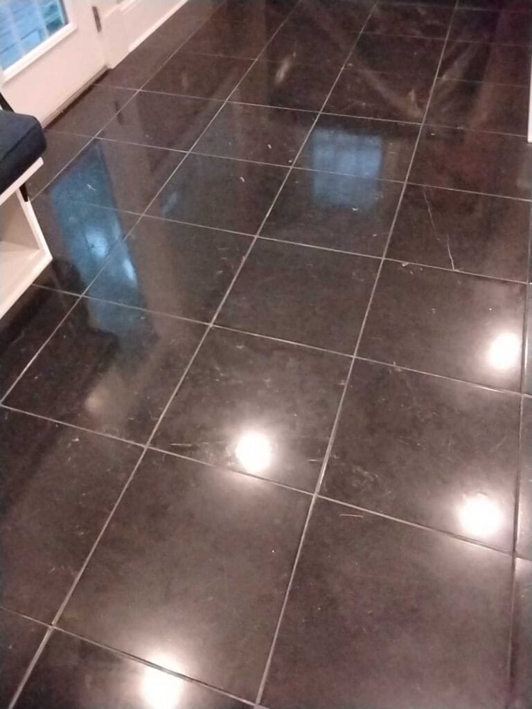 Polished dark tile floor from a Rose Restoration job in Washington, DC