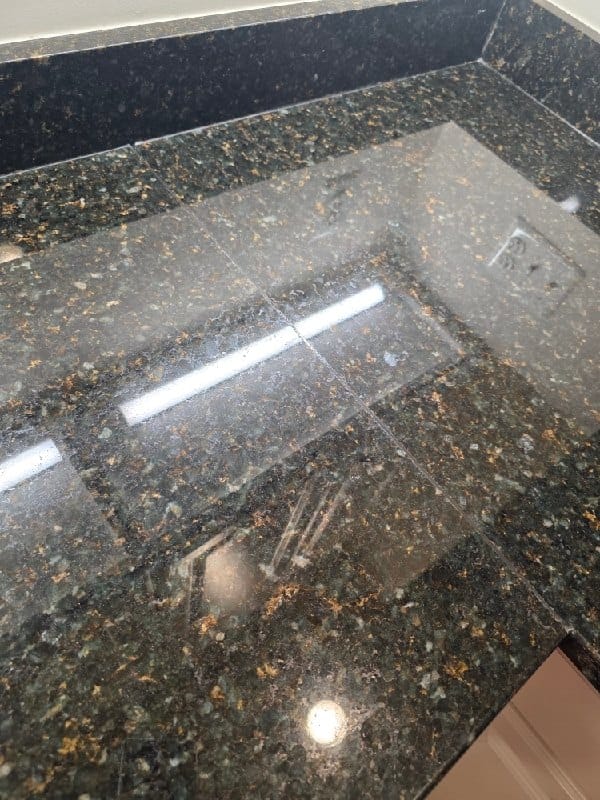 Polished granite countertop from a Rose Restoration job in Alexandria, VA