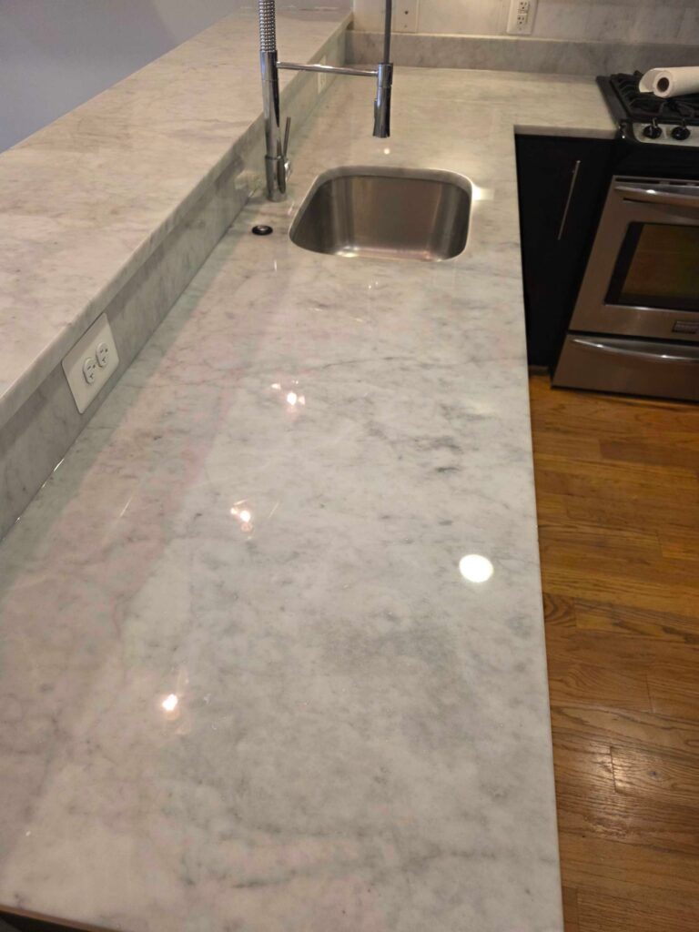 Polished marble countertop with sink from a Rose Restoration job in Washington, DC