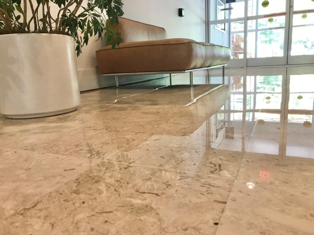 Polished stone floor in a bright lobby