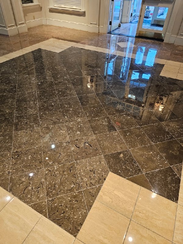 Polished stone floor with reflective surface from a Rose Restoration job in Tysons, VA